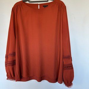 Ann taylor dark orange blouse with beautiful pattern on the sleaves